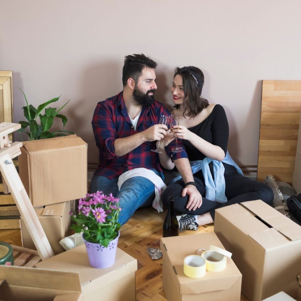First time home buyers celebrating after closing