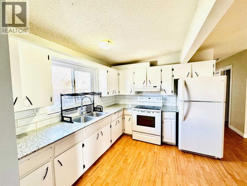 203 Penbrooke Close SE — photo 5