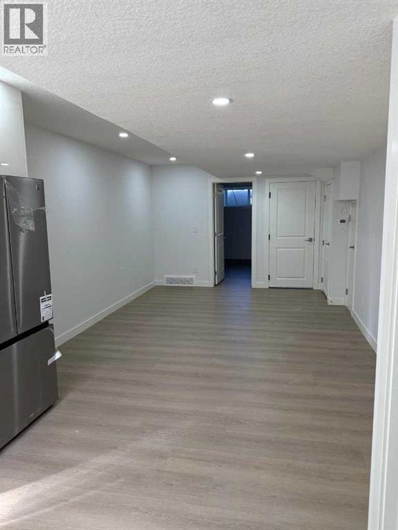 455 Tekarra Drive NW — photo 32