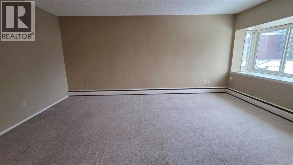 224, 8235 Elbow Drive SW — photo 16