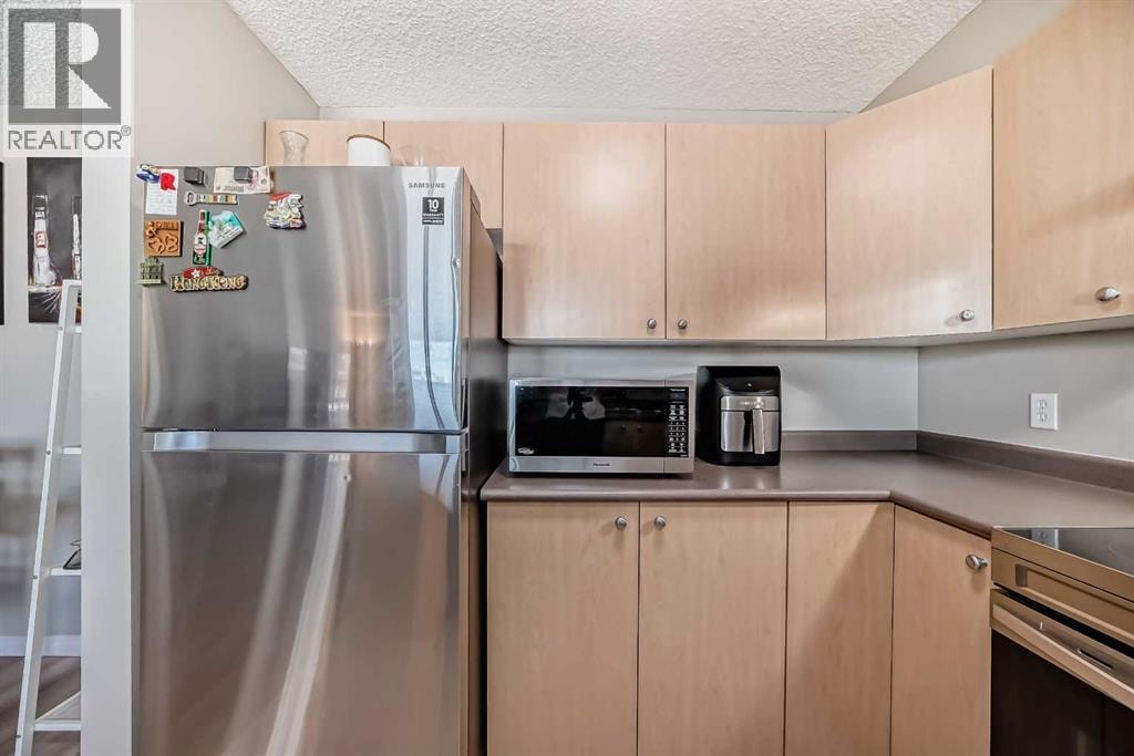 6310, 304 Mackenzie Way SW — photo 10