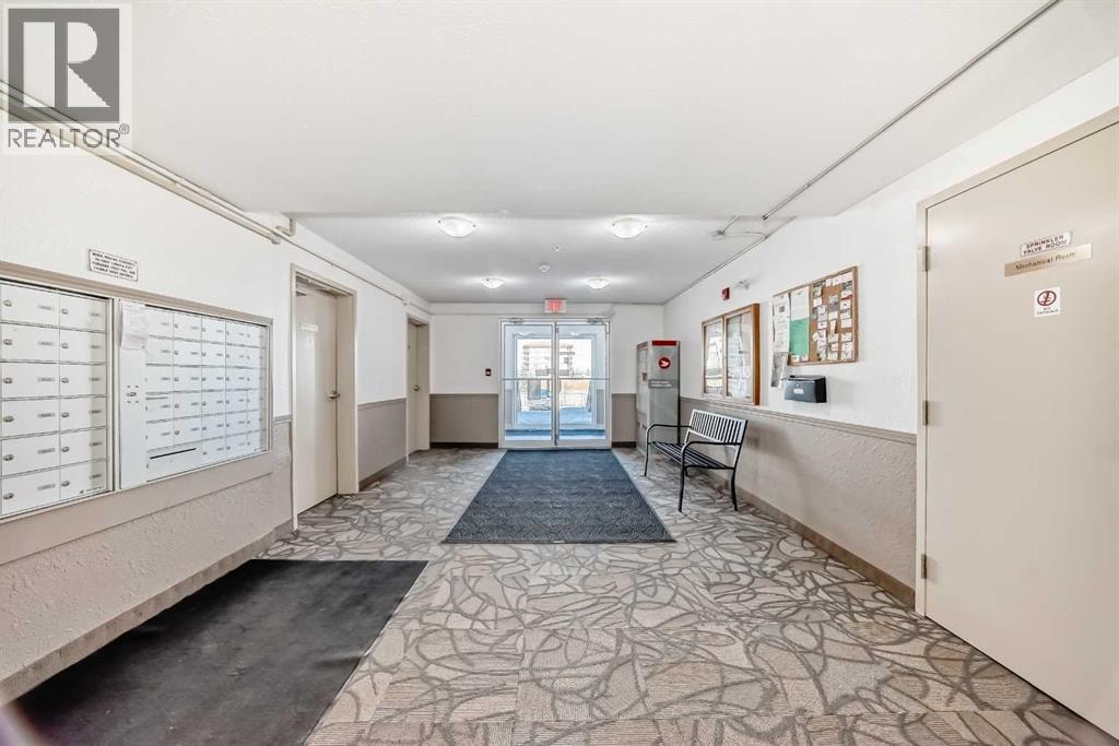 6310, 304 Mackenzie Way SW — photo 30