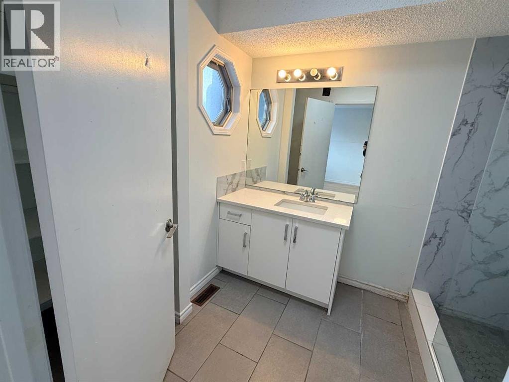 651 Macewan Drive NW — photo 13