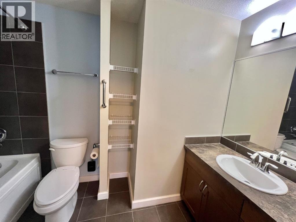 2607, 211 13 Avenue SE — photo 32