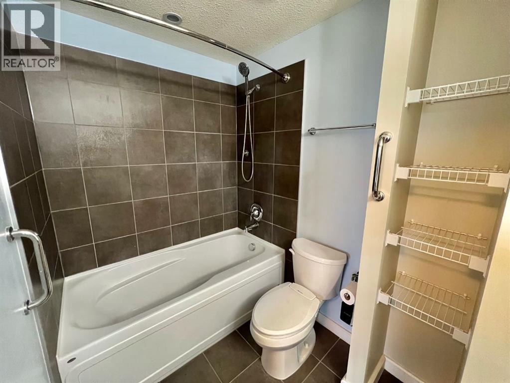 2607, 211 13 Avenue SE — photo 31