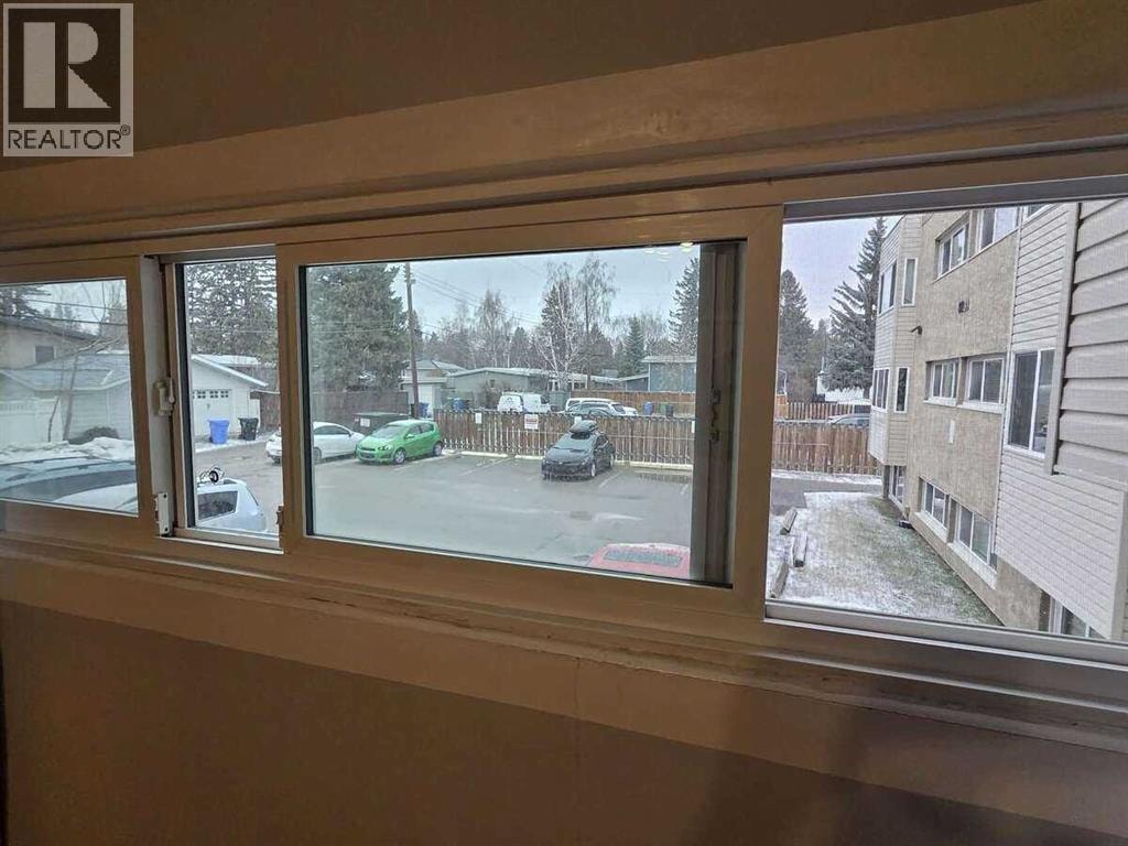 221, 8235 Elbow Drive SW — photo 32