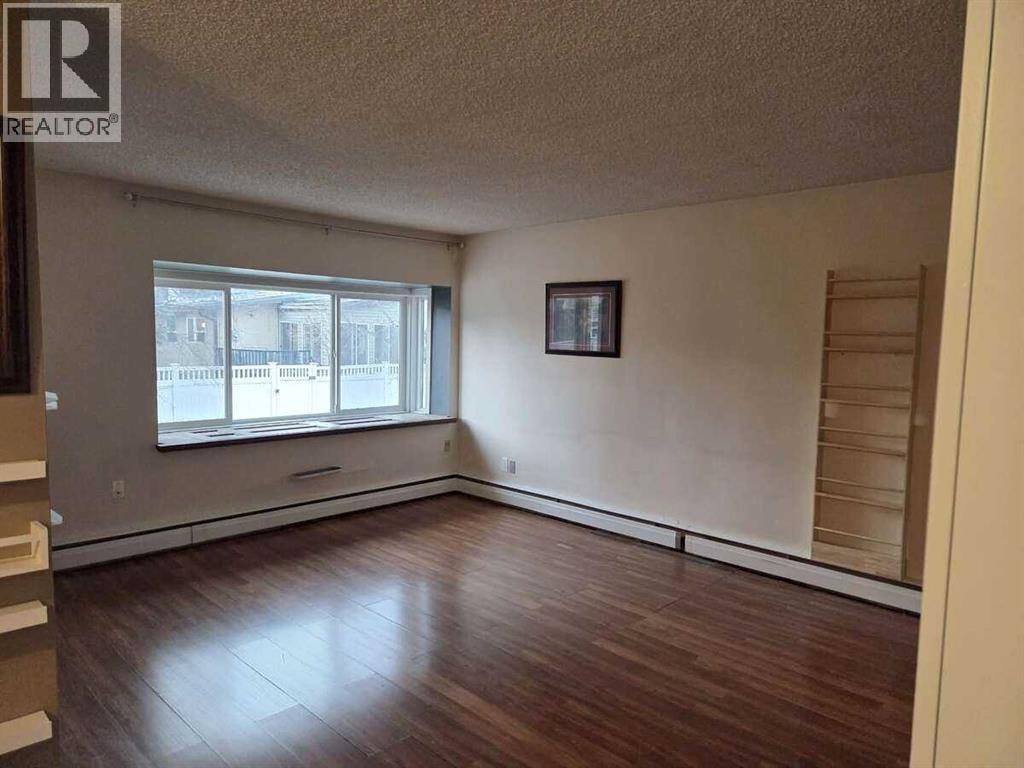 221, 8235 Elbow Drive SW — photo 4