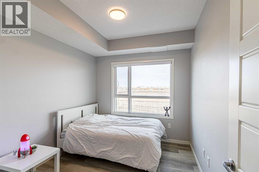 203, 360 Harvest Hills Way NE — photo 9
