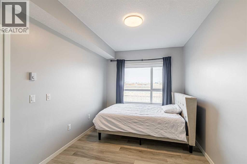 203, 360 Harvest Hills Way NE — photo 10