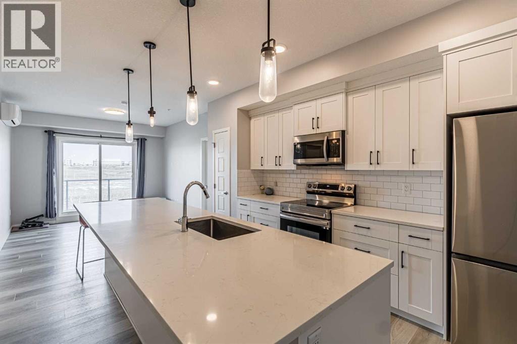 203, 360 Harvest Hills Way NE — photo 3