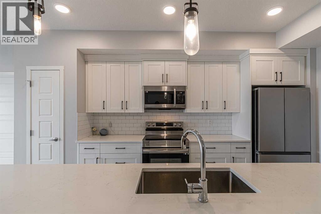 203, 360 Harvest Hills Way NE — photo 2