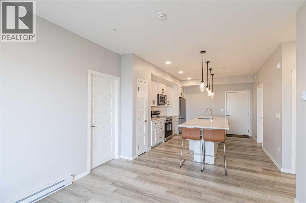 203, 360 Harvest Hills Way NE — photo 7