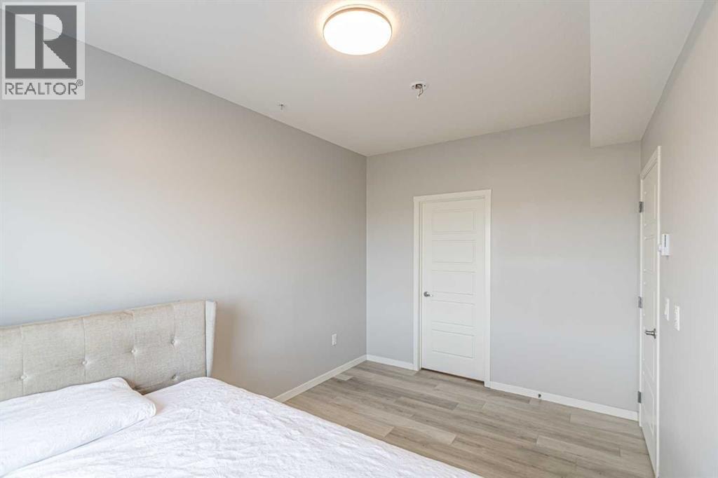 203, 360 Harvest Hills Way NE — photo 11
