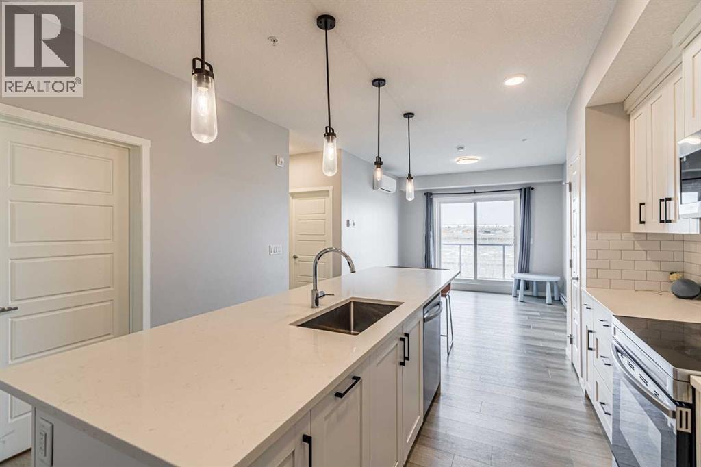 203, 360 Harvest Hills Way NE — photo 4