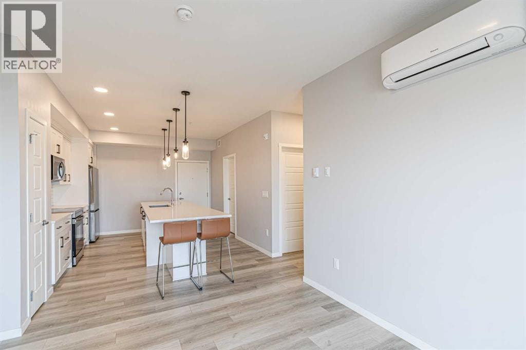 203, 360 Harvest Hills Way NE — photo 8