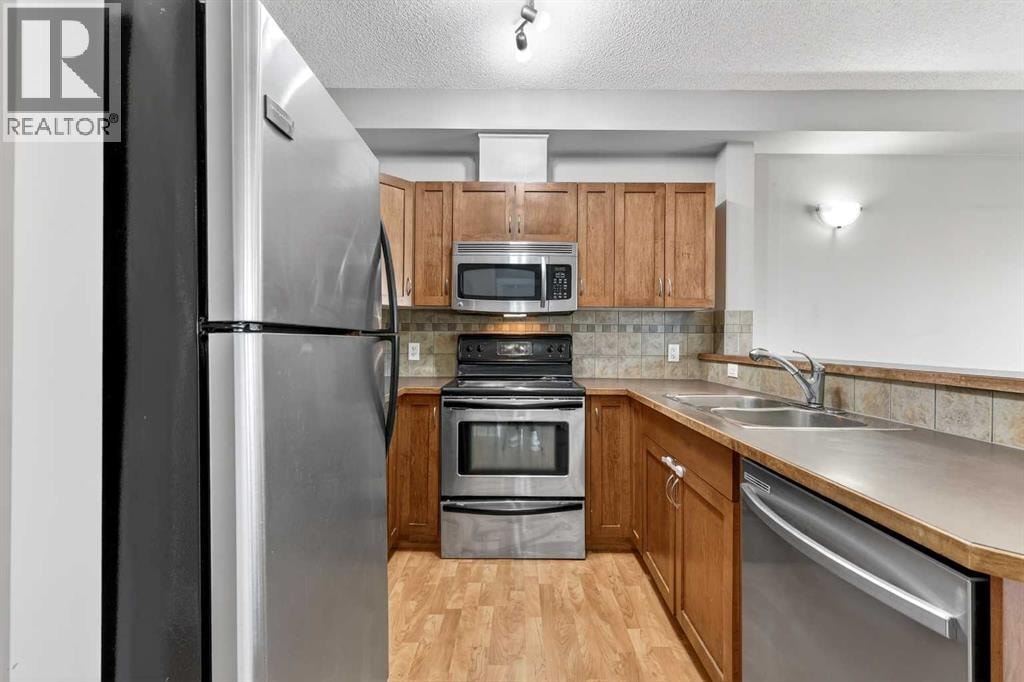 2101, 211 Aspen Stone Boulevard SW — photo 7