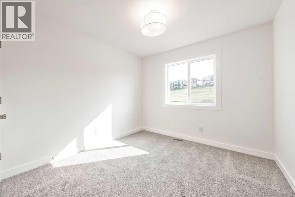 905, 525 River Heights Drive — photo 21
