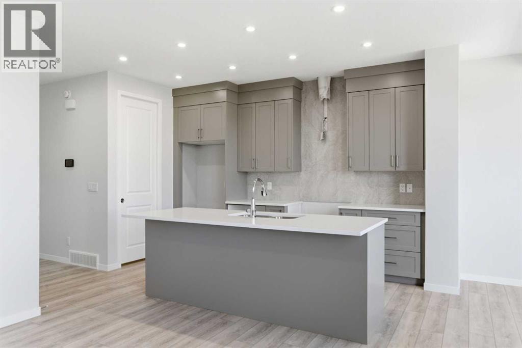623 Buffaloberry Manor SE — photo 3