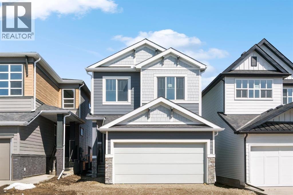 623 Buffaloberry Manor SE — photo 1