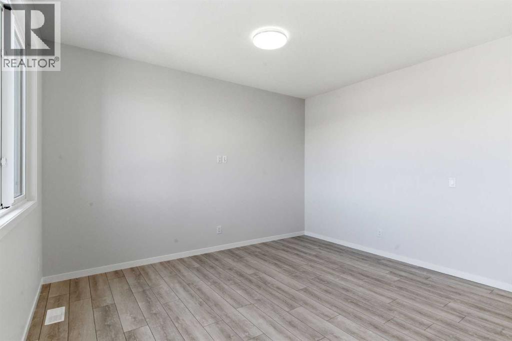 623 Buffaloberry Manor SE — photo 12