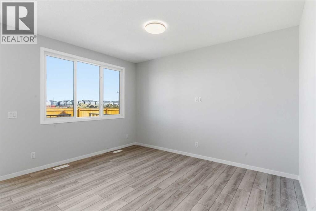 623 Buffaloberry Manor SE — photo 11