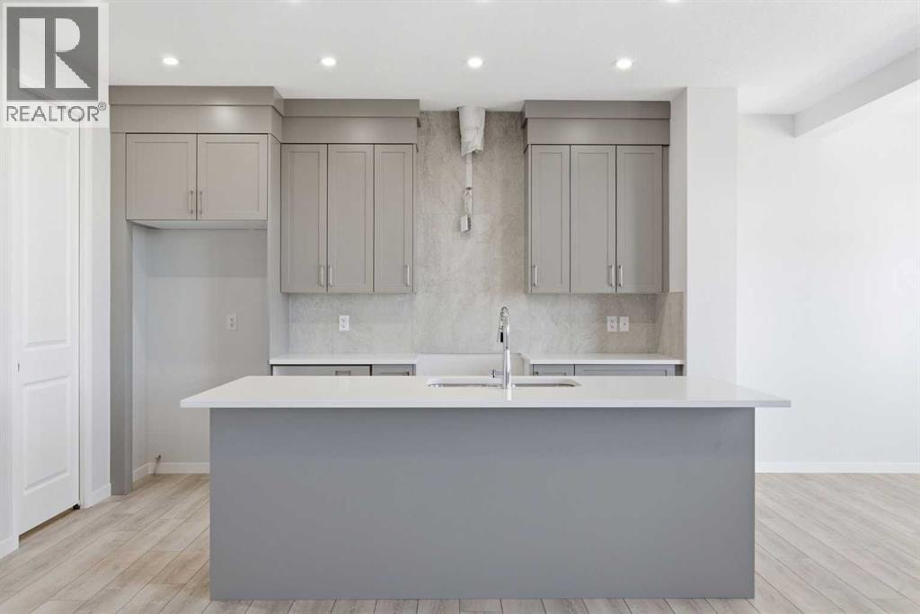 623 Buffaloberry Manor SE — photo 2