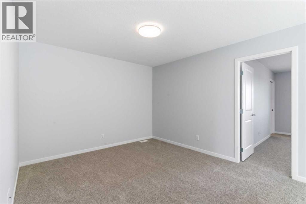623 Buffaloberry Manor SE — photo 24
