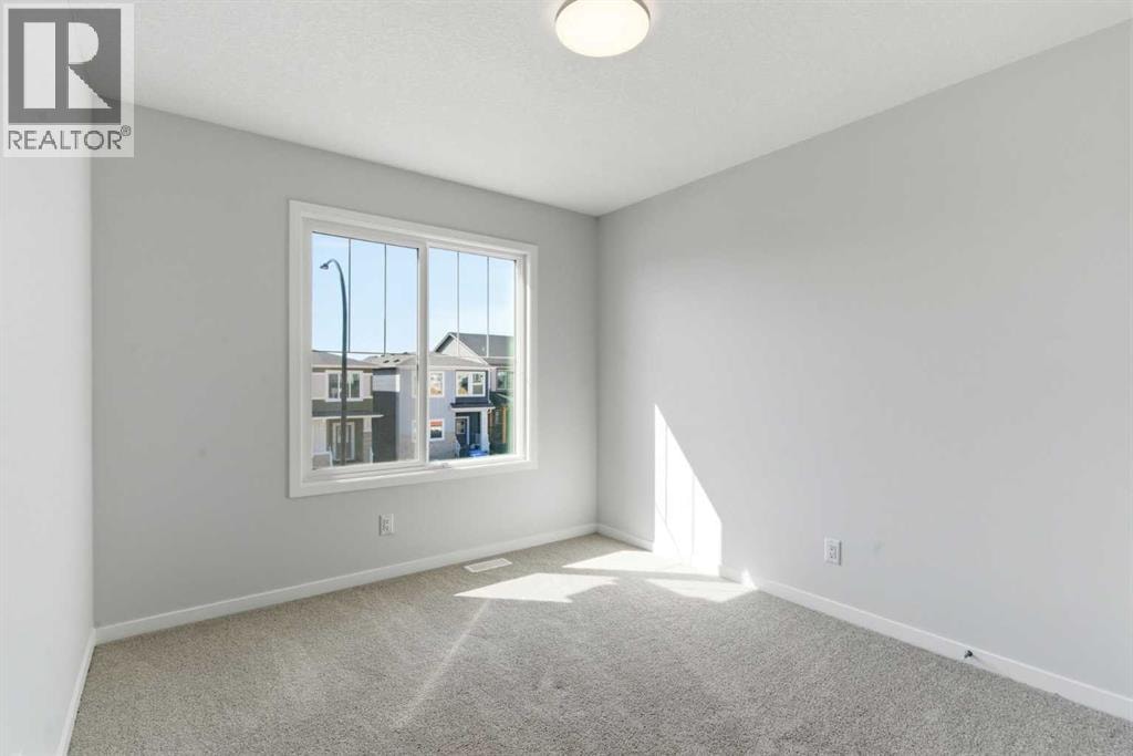 623 Buffaloberry Manor SE — photo 32