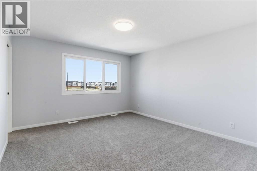 623 Buffaloberry Manor SE — photo 27