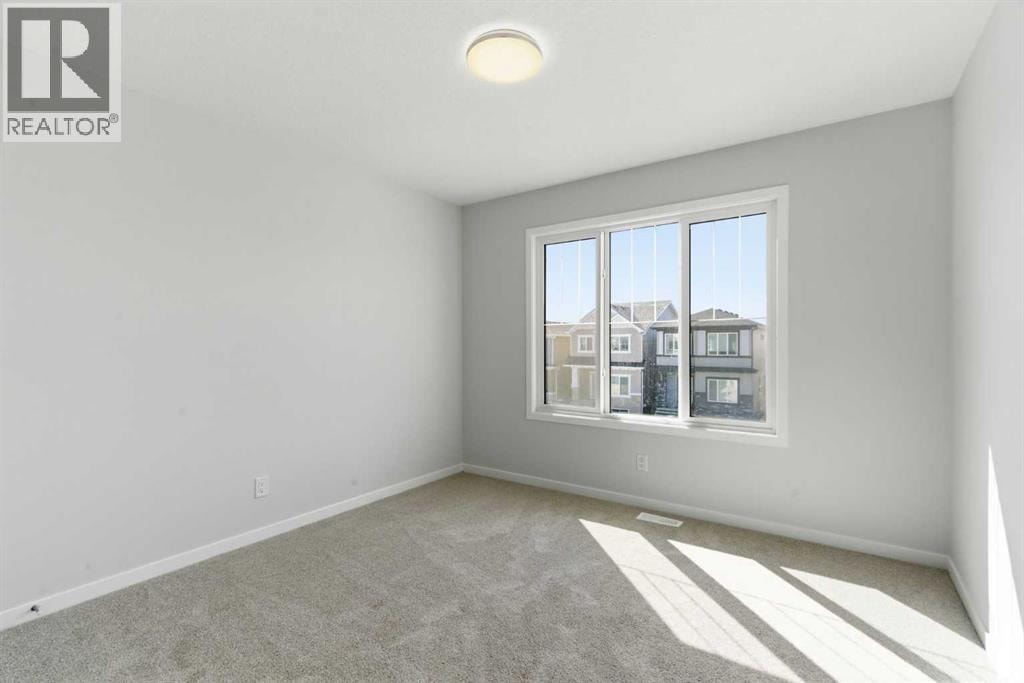 623 Buffaloberry Manor SE — photo 33