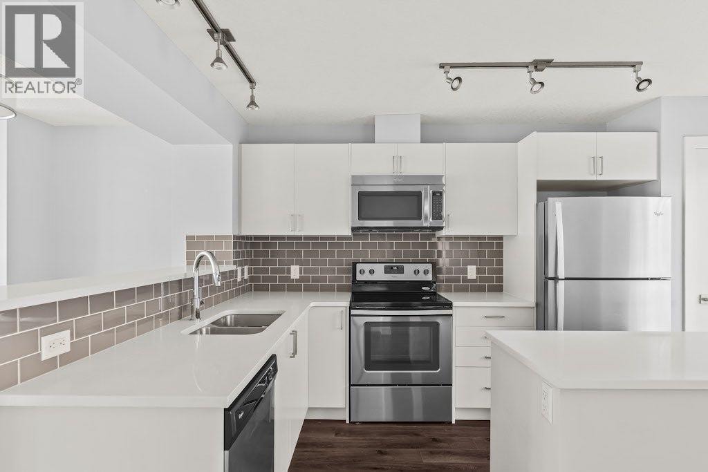 4 Evanscrest Gardens NW — photo 2