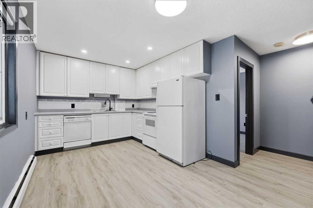 203, 3103 Blakiston Drive NW — photo 3