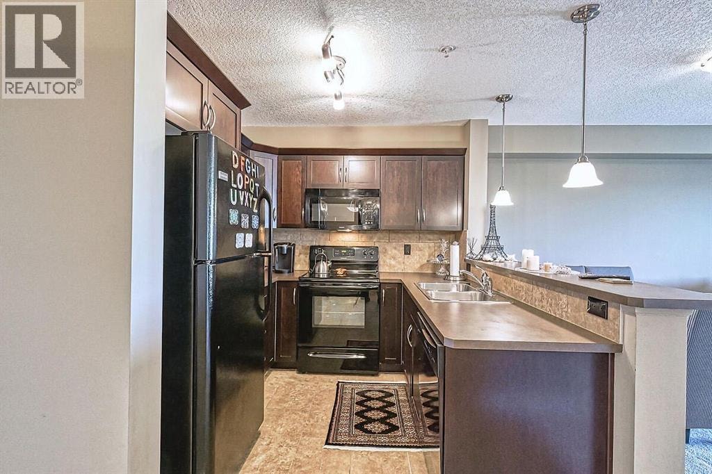 1304, 175 Panatella Hill NW — photo 10