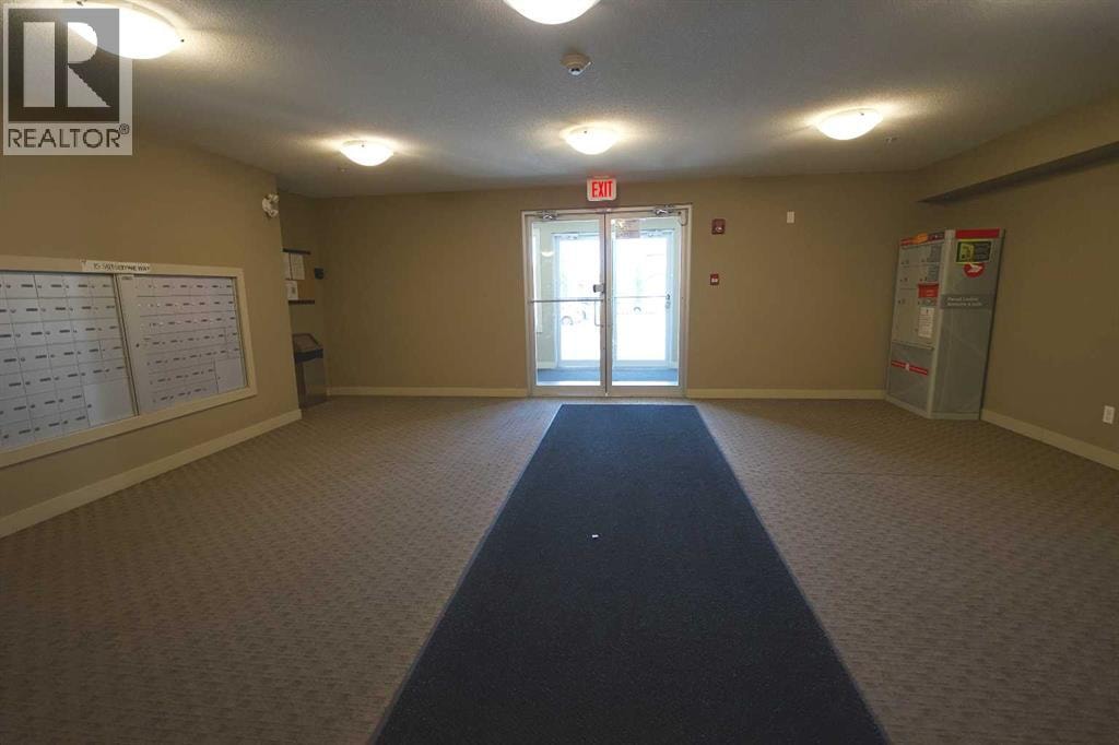 409, 15 Saddlestone Way NE — photo 2
