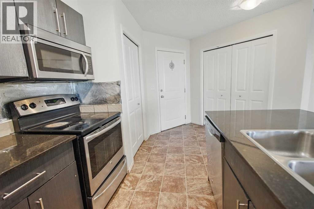 409, 15 Saddlestone Way NE — photo 4