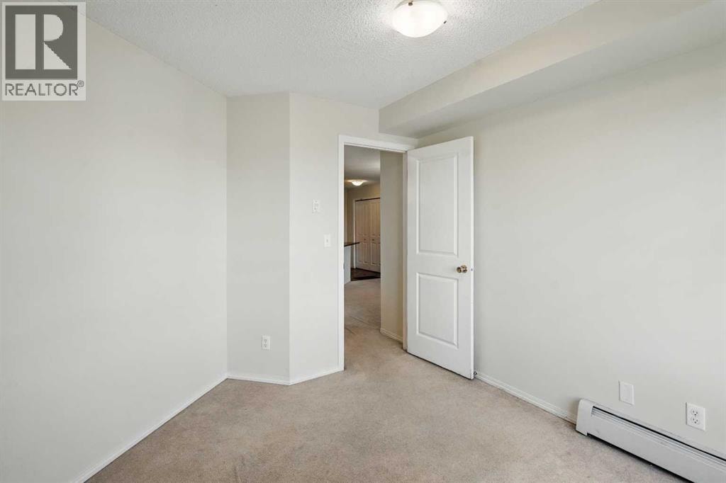 409, 15 Saddlestone Way NE — photo 11