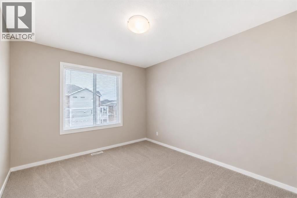 202, 245 Redstone Walk NE — photo 13