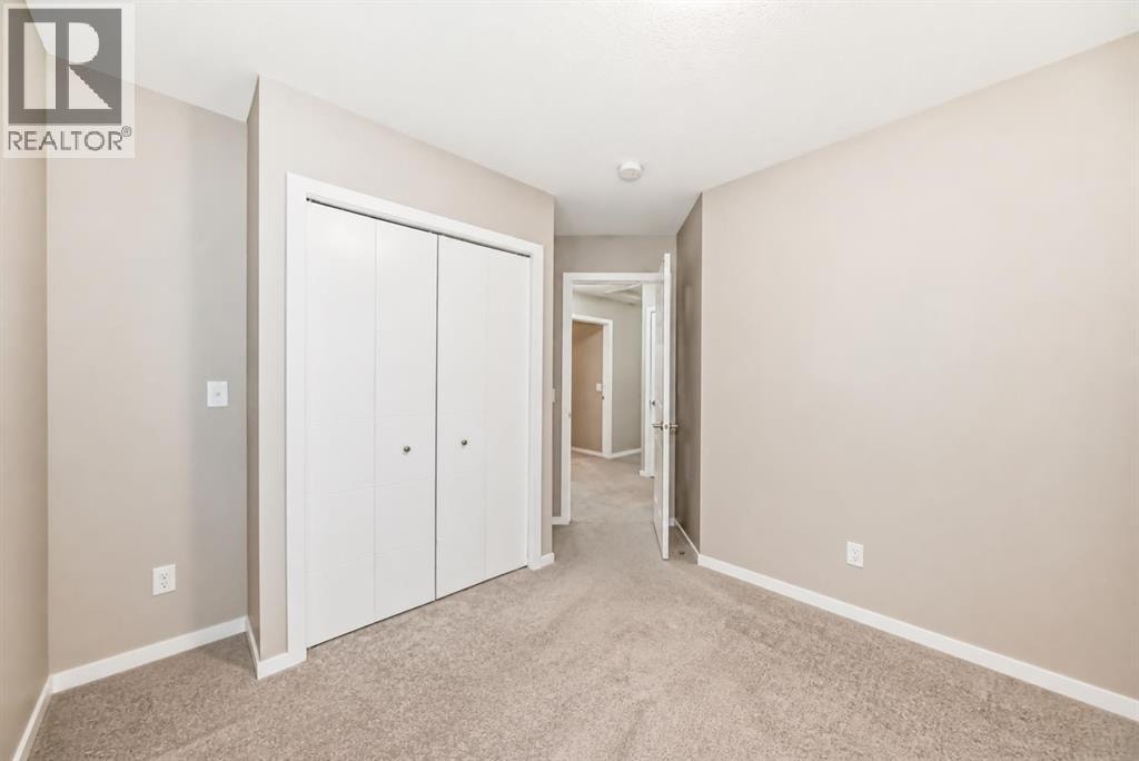 202, 245 Redstone Walk NE — photo 17