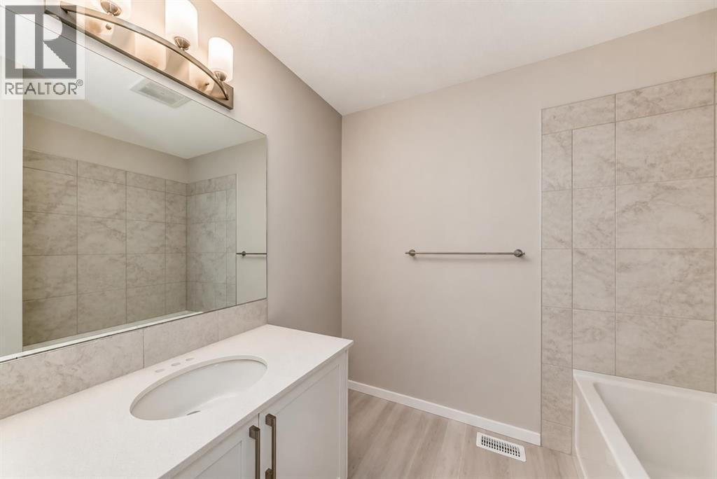202, 245 Redstone Walk NE — photo 18