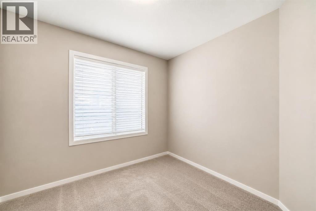 202, 245 Redstone Walk NE — photo 15