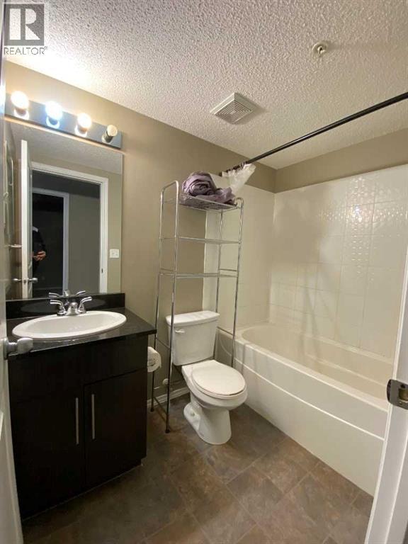8104, 403 Mackenzie Way SW — photo 13