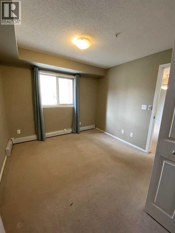 8104, 403 Mackenzie Way SW — photo 16
