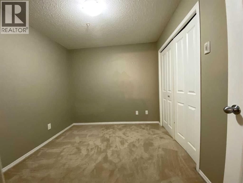 8104, 403 Mackenzie Way SW — photo 19