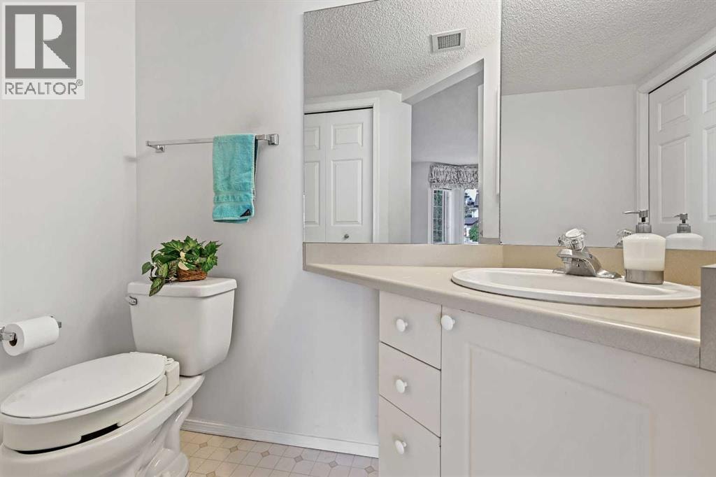 1206 Sienna Park Green SW — photo 14
