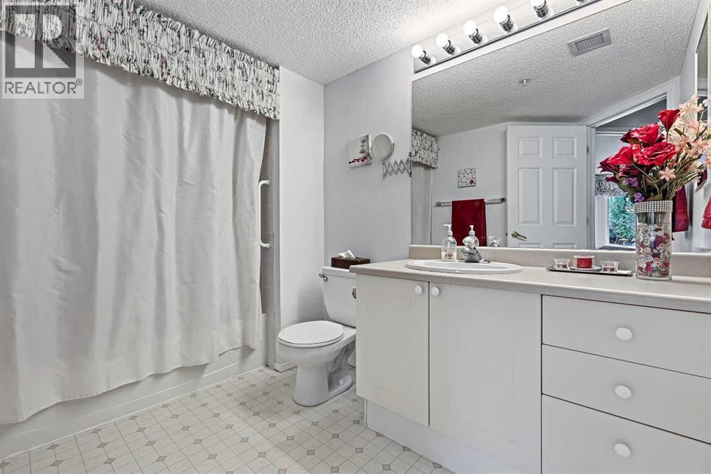 1206 Sienna Park Green SW — photo 17
