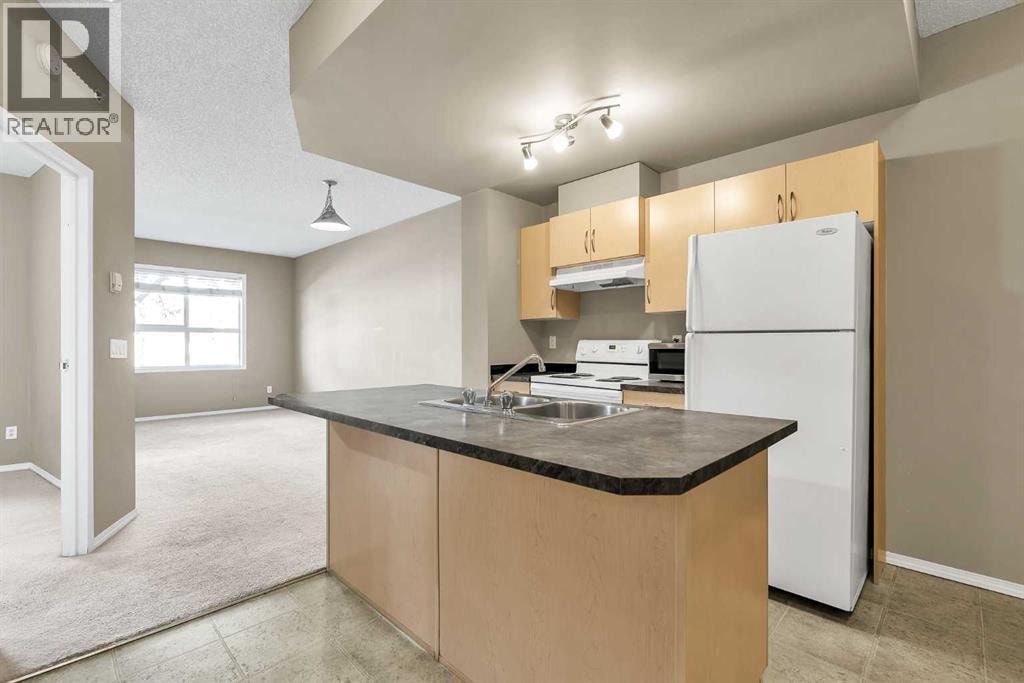 1103, 73 Erin Woods Court SE — photo 1