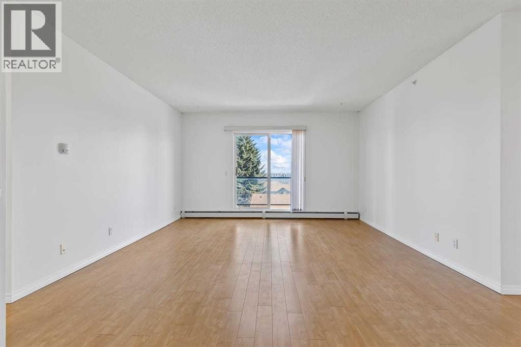 304, 2022 Canyon Meadows Drive SE — photo 3