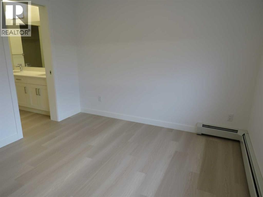 403, 70 Sage Hill Walk NW — photo 21