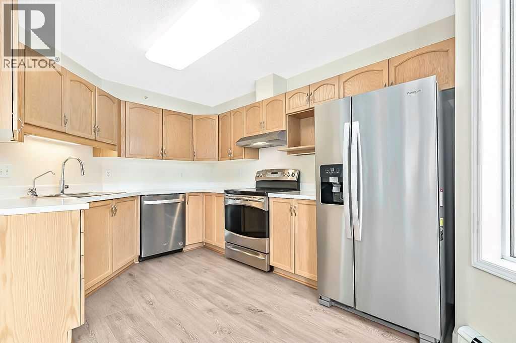 1103, 1103 Hawksbrow Point NW — photo 9