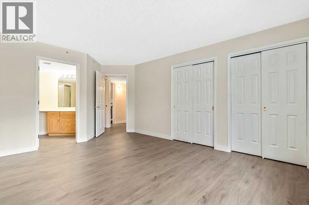 1103, 1103 Hawksbrow Point NW — photo 22